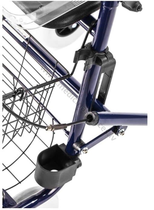 Rollators ar tērauda rāmi un četriem riteņiem.